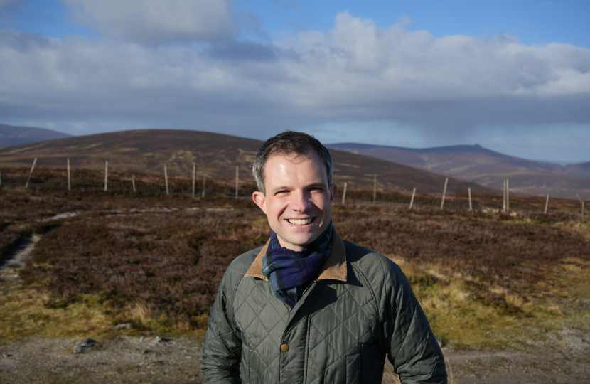 Andrew Bowie standing at the Cairn o Mount