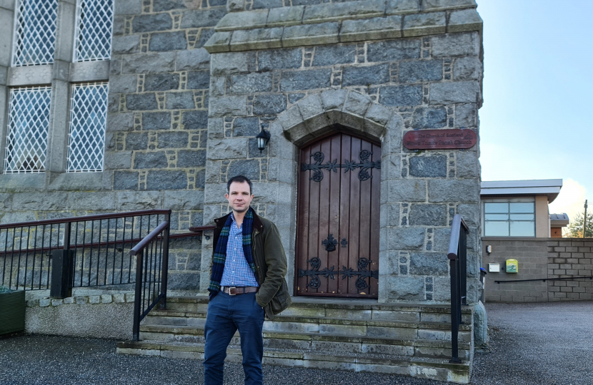 Andrew Bowie outside a Church