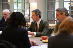 Andrew Bowie MP sitting at a table with representatives of Scotland's Veterans charities.