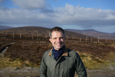 Andrew Bowie standing at the Cairn o Mount