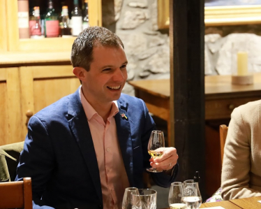 Andrew Bowie visiting a distillery 